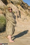 SpeedyBee. Fur Coat On The Beach Free Pic 2