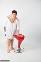 Tattoo Girl. Red Stool Free Pic 3