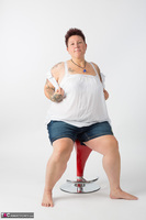 Tattoo Girl. Red Stool Free Pic 5