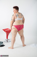 Tattoo Girl. Red Stool Free Pic 11