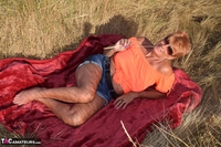 Dimonty. Stripping In The Dunes Free Pic 1