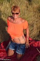 Dimonty. Stripping In The Dunes Free Pic 2