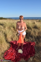 Dimonty. Stripping In The Dunes Free Pic 9