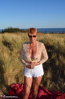 Dimonty. Stripping In The Dunes Free Pic 12