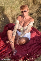 Dimonty. Stripping In The Dunes Free Pic 15
