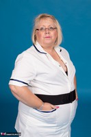 Lexie Cummings. Sexy Nurse Lexie Strips Free Pic 2