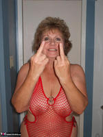 Busty Bliss. Red Fishnet Teddy Free Pic 9