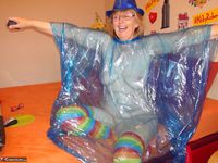 Abby Roberts. Posing In A Blue Transparent Raincoat Free Pic 12