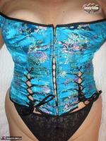 Busty Bliss. Teal Corset Showing Off That Arse! Free Pic 2