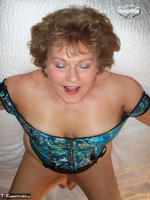 Busty Bliss. Teal Corset Showing Off That Arse! Free Pic 9