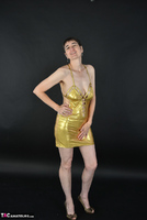 Hot Milf. In The Gold Dress Free Pic 1