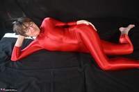 Hot Milf. Shiny Red Catuit Free Pic 1