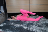 Hot Milf. Posing In A Pink Catsuit Free Pic 6