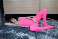 Hot Milf. Posing In A Pink Catsuit Free Pic 7