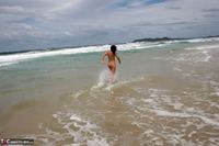 Roxeanne. Naked in the sand n surf Free Pic 1