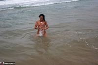 Roxeanne. Naked in the sand n surf Free Pic 17