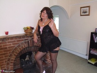 Cassandra UK. Stripping by the fire Free Pic 5
