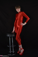 Hot Milf. Red Wetlook Shiny Spandex Catsuit Free Pic 1