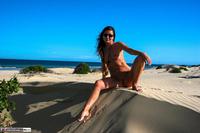 Roxeanne. Getting naked on the sand dunes Free Pic 17