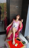 Diana Ananta. Smoking On The Balcony Free Pic 7