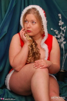 Luscious Models. Curvy Meile As Mrs Santa Stripping Free Pic 9