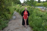 Barby Slut. Red Dress & Black Coat Flashing Free Pic 1