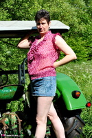 Hot Milf. Stripping On The Tractor Free Pic 1