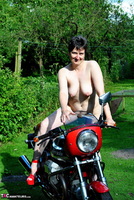 Hot Milf. Naked On The MotoGuzzi Free Pic 1