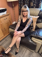 Inked MILF. Peeling off this sexy little black dress Free Pic 1