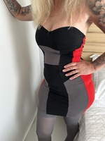 Inked MILF. Sexy grey dress with stockings and heels. Free Pic 2