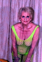 Sparkle. GILF Sparkle looks hot in her flourescent green bodysuit Free Pic 7