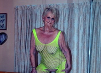Sparkle. GILF Sparkle looks hot in her flourescent green bodysuit Free Pic 9