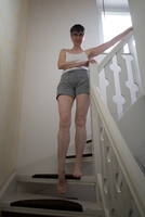 Hot Milf. Hot Pants On The Stairs Free Pic 1