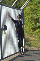 Hot Milf. Catsuit By The Gate Free Pic 1