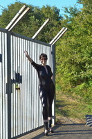 Hot Milf. Catsuit By The Gate Free Pic 2