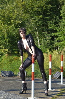 Hot Milf. Catsuit By The Gate Free Pic 14