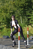 Hot Milf. Catsuit By The Gate Free Pic 15