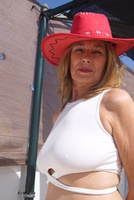Marta Style. Cowboy Hat and Boots Free Pic 3