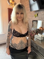 Inked MILF. Leather Skirt and Fishnet Stockings Free Pic 9