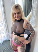 Inked MILF. Hot Pink Mini Skirt and See Through Top Free Pic 10