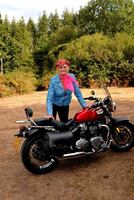 Sparkle. Leather GILF on a motorbike Free Pic 1