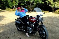 Sparkle. Leather GILF on a motorbike Free Pic 6