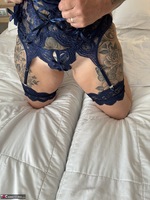 Inked MILF. Sexy Purple Lingerie with Killer Heels Free Pic 12