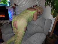 Sparkle. Wearing a bright yellow crutchless yellow body suit.  Free Pic 2