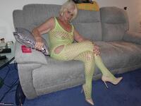 Sparkle. Wearing a bright yellow crutchless yellow body suit.  Free Pic 3