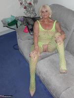 Sparkle. Wearing a bright yellow crutchless yellow body suit.  Free Pic 5