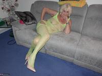 Sparkle. Wearing a bright yellow crutchless yellow body suit.  Free Pic 6