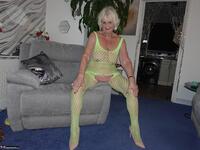 Sparkle. Wearing a bright yellow crutchless yellow body suit.  Free Pic 11