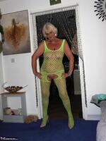 Sparkle. Wearing a bright yellow crutchless yellow body suit.  Free Pic 14