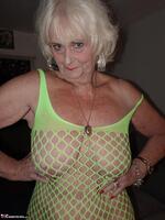 Sparkle. Wearing a bright yellow crutchless yellow body suit.  Free Pic 18